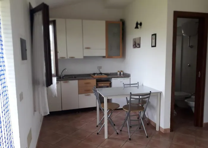 Dom wakacyjny Monolocale Con Giardino